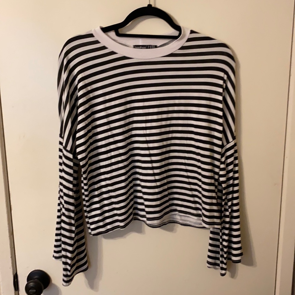 Black and white striped bell sleeve top
